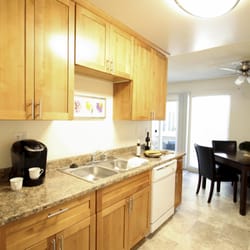 Kenwal Apartments - Completely remodeled kitchen with modern maple kitchen cabinets, new appliances including a dishwasher & microwave above the oven!
