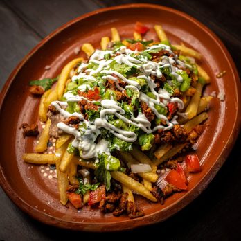 Taquero Mucho - Al pastor fries - Mexican Near Me - Chicago, Illinois Taquero Mucho - Al pastor fries - Mexican Near Me - Chicago, Illinois