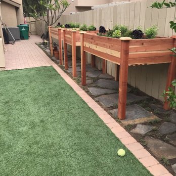 Aloha 'Aina Landscaping - Custom made planter boxes and flagstone installation. - Landscaping Near Me - Waimanalo, Hawaii