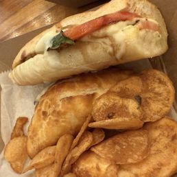 Caprese sandwich, with chips, and 4 cheese empanada Caprese sandwich, with chips, and 4 cheese empanada