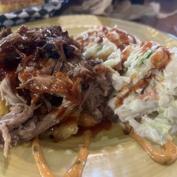 Stottlemyer's Smokehouse - Cornbread Smokestacks  Pulled pork and pineapple coleslaw over a bed of cornbread - Barbeque Near Me - Sarasota, Florida