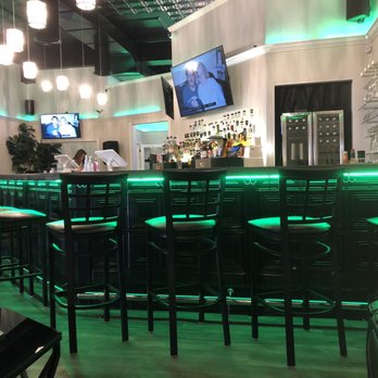 The Garden Lounge - a bar with green lights - Lounges Near Me - West Bend, Wisconsin The Garden Lounge - a bar with green lights - Lounges Near Me - West Bend, Wisconsin