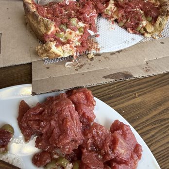 Rosati's - The stewed tomatoes we scooped off are on the plate. - Italian Near Me - St. Augustine, Florida Rosati's - The stewed tomatoes we scooped off are on the plate. - Italian Near Me - St. Augustine, Florida