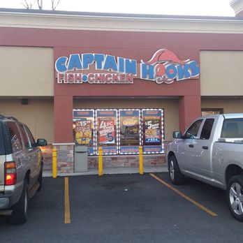 Captain Hooks Fish & Chicken - two trucks parked in front of the store - Southern Near Me - Markham, Illinois Captain Hooks Fish & Chicken - two trucks parked in front of the store - Southern Near Me - Markham, Illinois