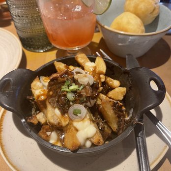 Chubby's Jamaican Kitchen - Oxtail poutine w/ dumplings - Caribbean Near Me - Toronto, Ontario
