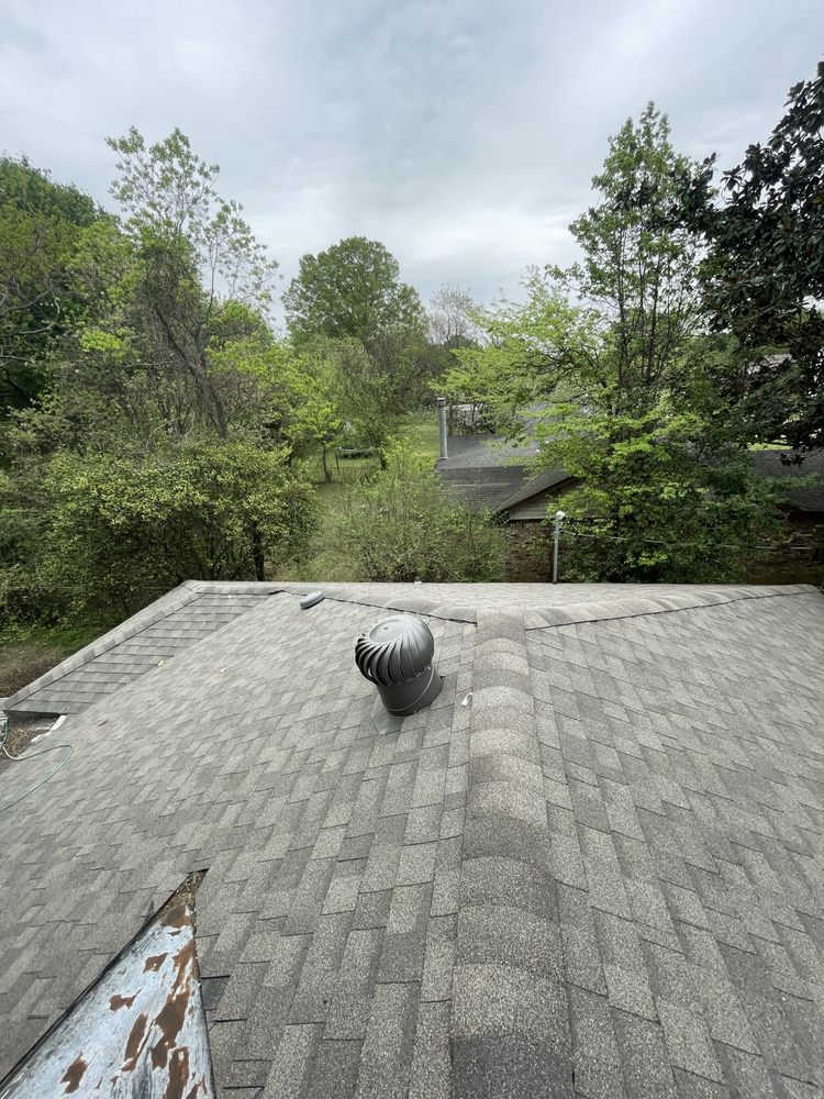 Slide of E&J Roofing & Siding