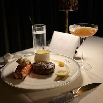 The Ruxton - Filet minion with lobster tails for the birthday girl - Steakhouses Near Me - Baltimore, Maryland