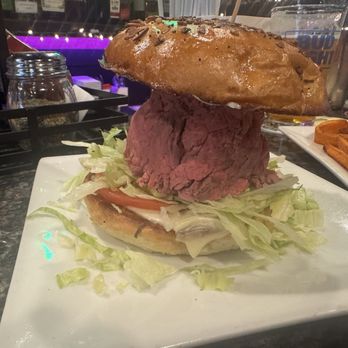 Zo's Place - Super roast beef on a toasted onion roll. - Pizza Near Me - Manchester, New Hampshire Zo's Place - Super roast beef on a toasted onion roll. - Pizza Near Me - Manchester, New Hampshire