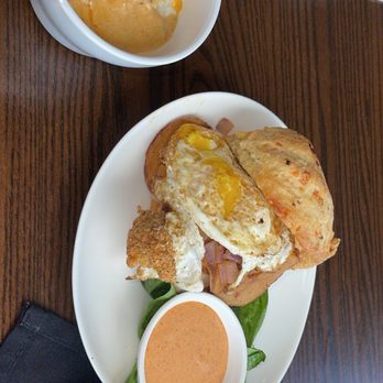Eat My Biscuits - Catfish biscuit and cheese grits with their seafood sauce..HAVE MERCY - Breakfast & Brunch Near Me - East Point, Georgia Eat My Biscuits - Catfish biscuit and cheese grits with their seafood sauce..HAVE MERCY - Breakfast & Brunch Near Me - East Point, Georgia