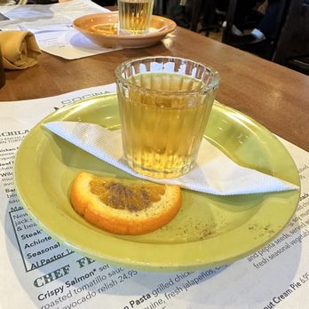 Cocina Madrigal - Chilled Anejo tequila with a slice of orange sprinkled with cinnamon. The way tequila should be shot - Tacos Near Me - Phoenix, Arizona