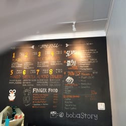 Boba Story - Menu on the board behind the register
