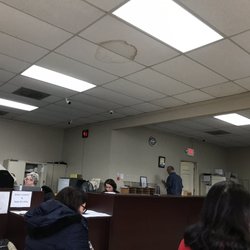 West County License Bureau - More people doing nothing while dozens wait.