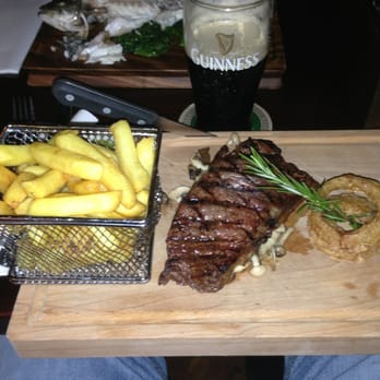 The Jarvey's Rest - Sirloin, mushroom, chips, and onion rings with a sprig of sage. - Pubs Near Me - Killarney, Kentucky The Jarvey's Rest - Sirloin, mushroom, chips, and onion rings with a sprig of sage. - Pubs Near Me - Killarney, Kentucky