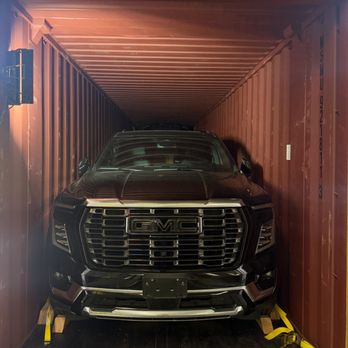 USKO Shipping - GMC loaded into the container and secured with wheel blocks and tie-down straps, ready for export overseas from our Sacramento warehouse. - Vehicle Shipping Near Me - West Sacramento, California USKO Shipping - GMC loaded into the container and secured with wheel blocks and tie-down straps, ready for export overseas from our Sacramento warehouse. - Vehicle Shipping Near Me - West Sacramento, California