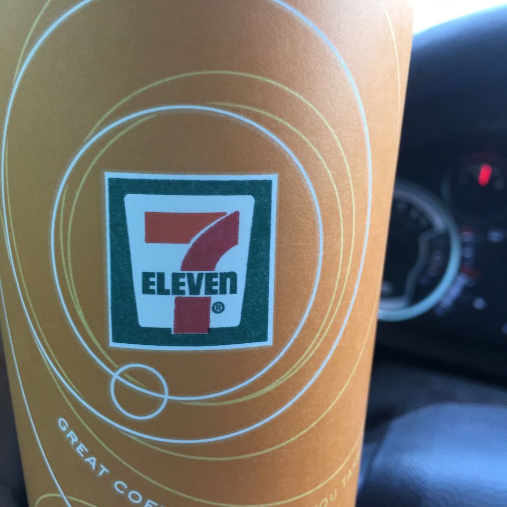 7-Eleven - a hand holding a cup of coffee - Convenience Stores Near Me - Plano, Texas 7-Eleven - a hand holding a cup of coffee - Convenience Stores Near Me - Plano, Texas