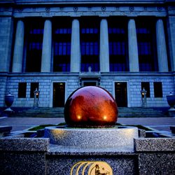 Kansas City Life Insurance Company - Kansas City Life Insurance Company building and Kugel fountain at night.