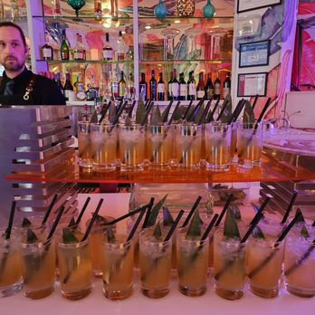 Rumba Lounge at Carnivale - a bartender behind the bar - Lounges Near Me - Chicago, Illinois Rumba Lounge at Carnivale - a bartender behind the bar - Lounges Near Me - Chicago, Illinois