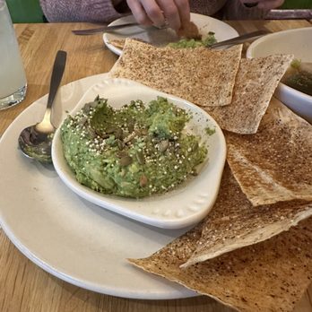 True Food Kitchen - Edamame guacamole with crackers - New American Near Me - Arlington, Virginia True Food Kitchen - Edamame guacamole with crackers - New American Near Me - Arlington, Virginia