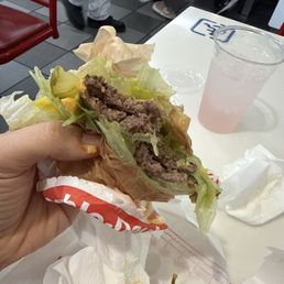 Half eaten lettuce, wrapped burger with no salt on the patty, pickles and it was perfectly delicious