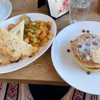 Milkweed - Chocolate Chip Pancakes with home fries and bacon - New American Near Me - Boston, Massachusetts Milkweed - Chocolate Chip Pancakes with home fries and bacon - New American Near Me - Boston, Massachusetts