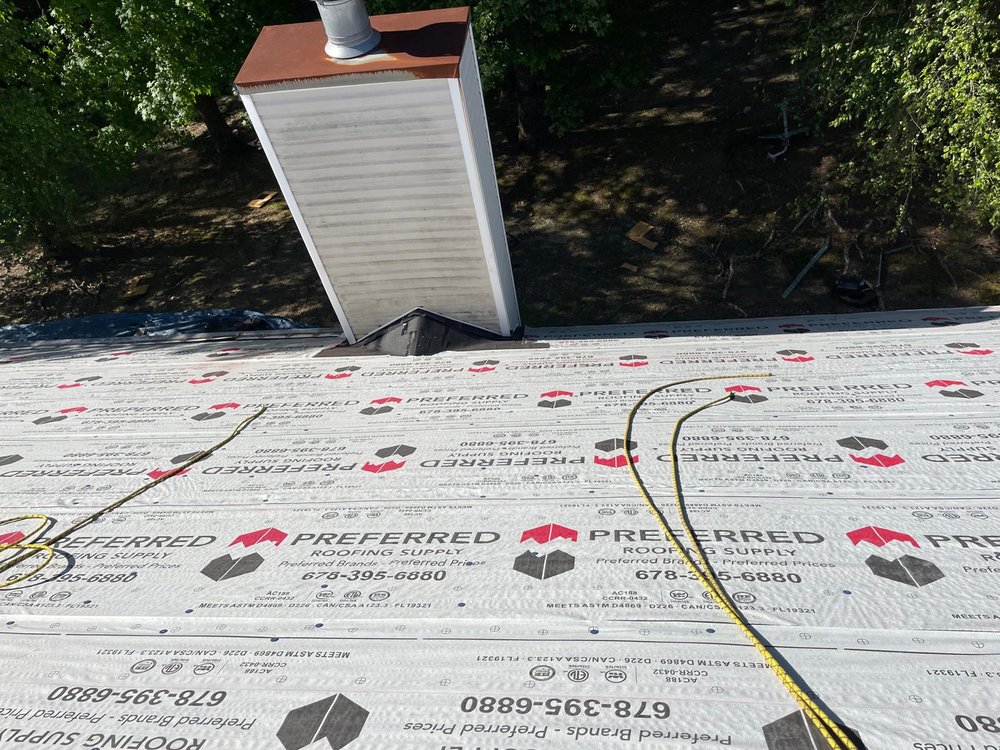 Slide of Umana Roofing