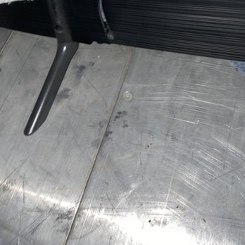 Grandmas Boy Moving - Image of broken back panel and how TV stand was laid bare in truck - Movers Near Me - Seattle, Washington Grandmas Boy Moving - Image of broken back panel and how TV stand was laid bare in truck - Movers Near Me - Seattle, Washington