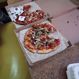 Two pizzas one combo other make your own ingredients. Two pizzas one combo other make your own ingredients.