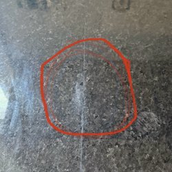 Lowe's Home Improvement - Marred surface resulting from abrasive over epoxy fill attempt on chip
