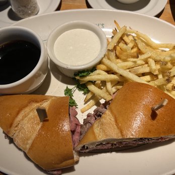 Houston's Restaurant - french dip au jus: thinly sliced roasted prime rib on a toasted french roll with french fries = $25 - New American Near Me - Irvine, California Houston's Restaurant - french dip au jus: thinly sliced roasted prime rib on a toasted french roll with french fries = $25 - New American Near Me - Irvine, California