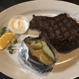 10 oz Ribeye ($18) (Well done) & Baked Potato: Perfect Steak, Great Potato
