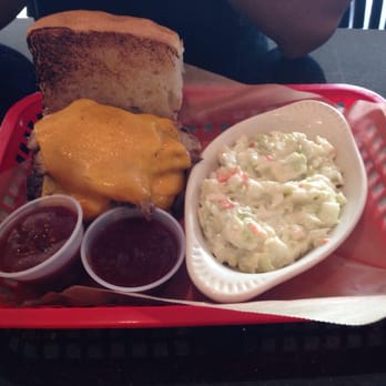 Fatback's - Pork on a cow burger with a side of coleslaw - Barbeque Near Me - Dothan, Alabama Fatback's - Pork on a cow burger with a side of coleslaw - Barbeque Near Me - Dothan, Alabama