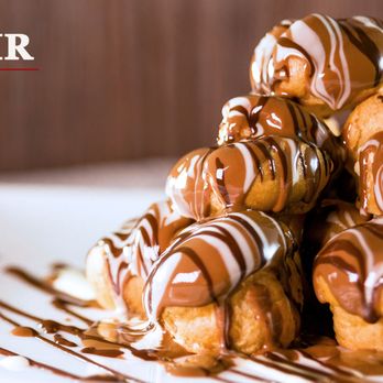 Melt N Dip - a pile of donuts covered in chocolate - Creperies Near Me - West Bloomfield Township, Michigan Melt N Dip - a pile of donuts covered in chocolate - Creperies Near Me - West Bloomfield Township, Michigan