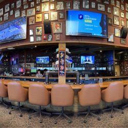 The Lucky Mutt - The bar is long with TVs galore!
