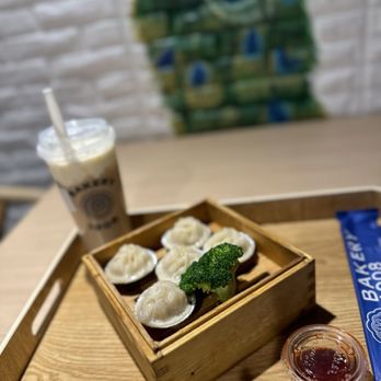 Bakery 1908 - Shanghai dumplings with 1908 milk tea and cheese mousse - Bakeries Near Me - Orlando, Florida