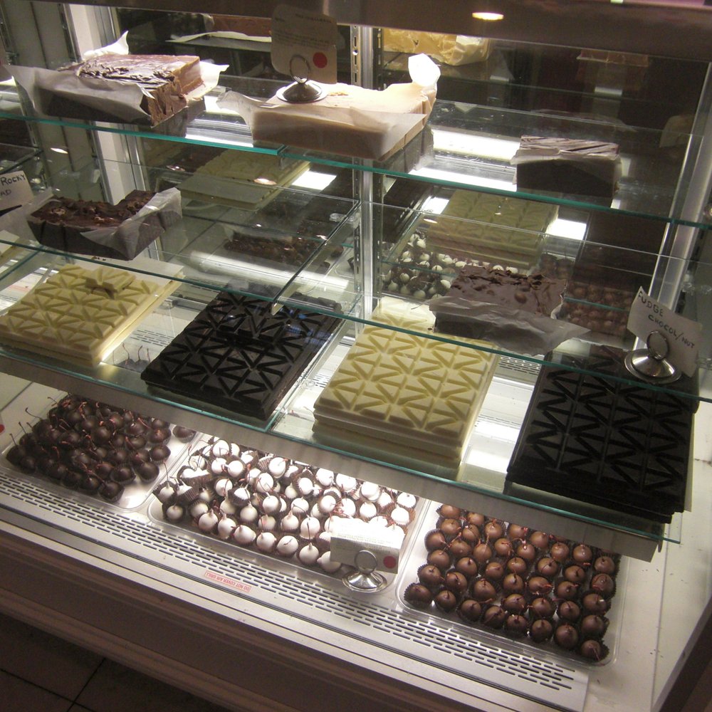 Paradise Candy - a variety of chocolates in a display case - Candy Stores Near Me - New York, New York Paradise Candy - a variety of chocolates in a display case - Candy Stores Near Me - New York, New York