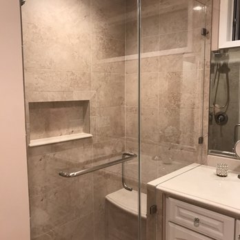 ReBuilt - Santos is a tile master. Attention to details, always. Quartz bench and niche shelf is the same as vanity. Ceasarstone - Dreamy Marfil - Home Services Near Me - Long Beach, California ReBuilt - Santos is a tile master. Attention to details, always. Quartz bench and niche shelf is the same as vanity. Ceasarstone - Dreamy Marfil - Home Services Near Me - Long Beach, California