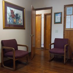 Ward Eye Center - Part of the waiting room, nice comfortable chairs and very clean.