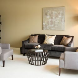 Anew Decor - We created this inviting contemporary living room by blending a variety of elements: metals, wood, textured fabrics, with splashes of shine.