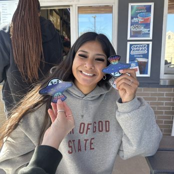 Dutch Bros Coffee - Happy young customer - Juice Bars & Smoothies Near Me - Cedar Hill, Texas