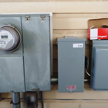 Evolve Electric - The new boxes are in the middle (MTS switch) and right (plug receptacle.) - Electricians Near Me