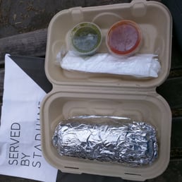 a sandwich in a styrofoam container a sandwich in a styrofoam container
