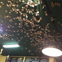 Carelli's Pizzeria & Pasta - Paper money on the ceiling