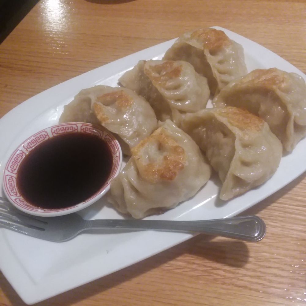 Lee's Wok - Giant homemade pork filled Potstickers - savory little hand pies of heaven! - Chinese Near Me - Newport, Oregon Lee's Wok - Giant homemade pork filled Potstickers - savory little hand pies of heaven! - Chinese Near Me - Newport, Oregon