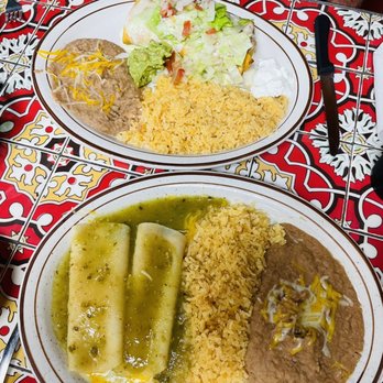 Juanita’s Mexican Restaurant - Chimichanga (top) and cheese enchiladas with tomatillo sauce - Mexican Near Me - Sperry, Oklahoma Juanita’s Mexican Restaurant - Chimichanga (top) and cheese enchiladas with tomatillo sauce - Mexican Near Me - Sperry, Oklahoma