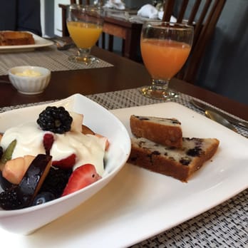 Abbeymoore Manor Bed & Breakfast - First course: fruit and yogurt served with blueberry-lemon bread - Bed & Breakfast Near Me - Victoria, British Columbia Abbeymoore Manor Bed & Breakfast - First course: fruit and yogurt served with blueberry-lemon bread - Bed & Breakfast Near Me - Victoria, British Columbia