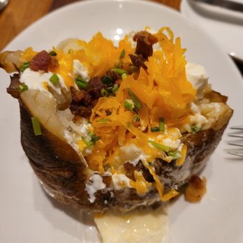 Stoney River - 1lb loaded baked potato - Steakhouses Near Me - Annapolis, Maryland Stoney River - 1lb loaded baked potato - Steakhouses Near Me - Annapolis, Maryland