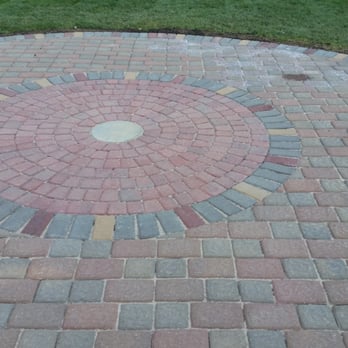 All Phases Landscaping - a circular brick patio - Snow Removal Near Me - Grand Ledge, Michigan All Phases Landscaping - a circular brick patio - Snow Removal Near Me - Grand Ledge, Michigan