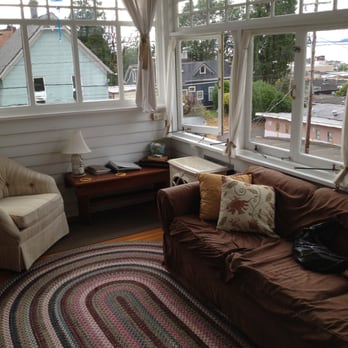 Rose River Inn Bed & Breakfast - River Suite enclosed sun porch with fireplace. - Hotels Near Me - Astoria, Oregon Rose River Inn Bed & Breakfast - River Suite enclosed sun porch with fireplace. - Hotels Near Me - Astoria, Oregon
