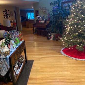 AAA Floor Refinishing - a christmas tree in a living room - Flooring Near Me AAA Floor Refinishing - a christmas tree in a living room - Flooring Near Me