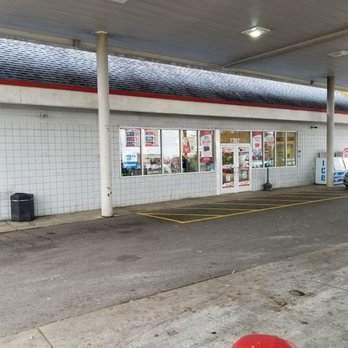 Speedway - a car parked in front of a gas station - Convenience Stores Near Me - West Chester, Ohio